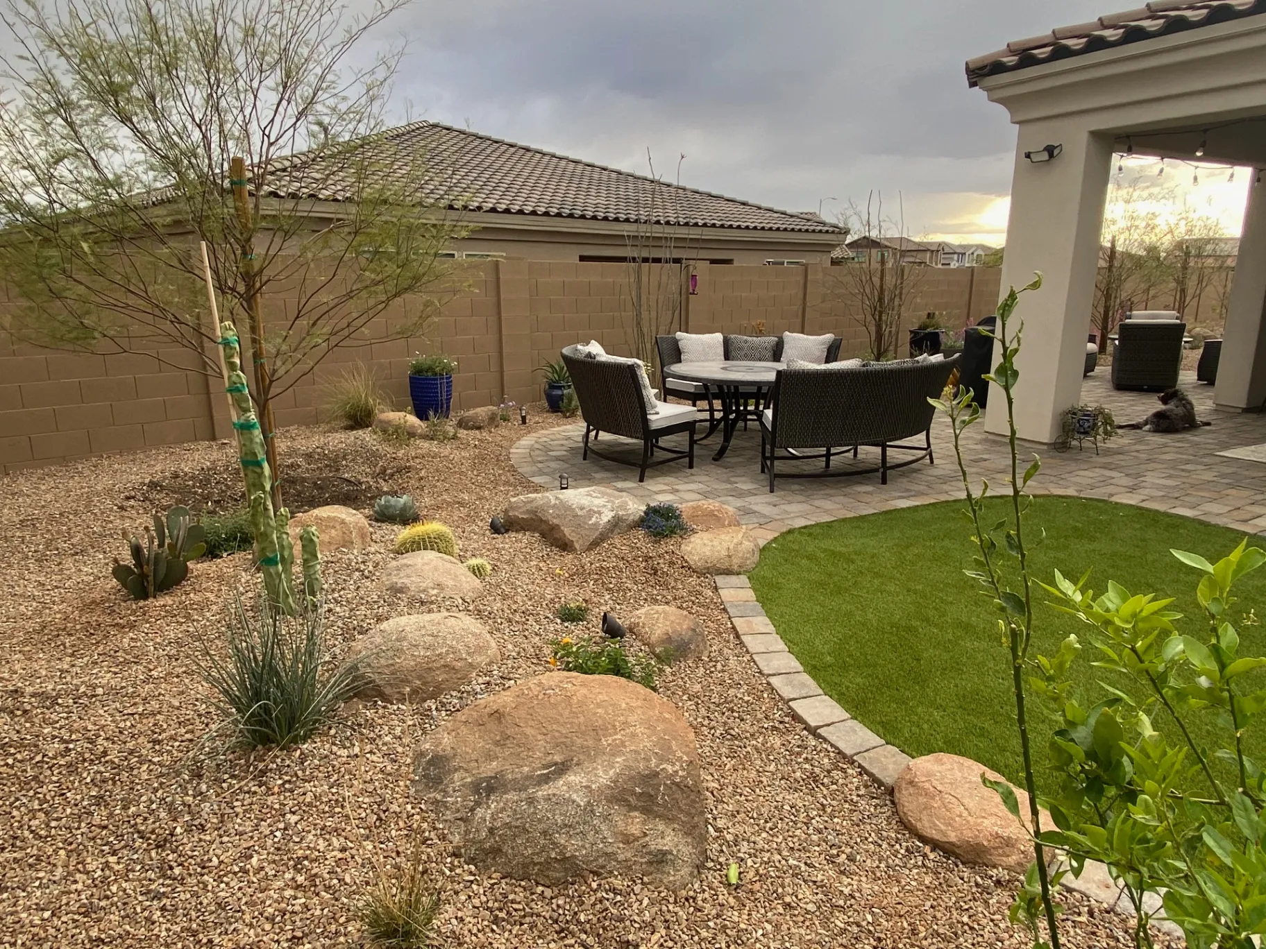 Outdoor dining area with desert landscape