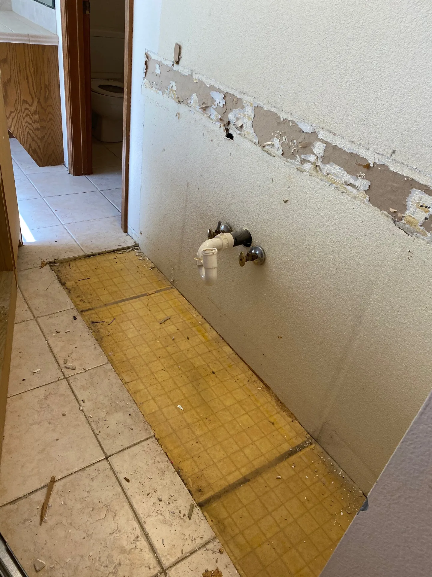 Multiple layers of old flooring exposed